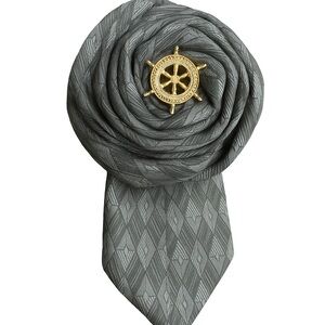 Reimagined necktie Brooch with Vintage Jewelry embellishment.